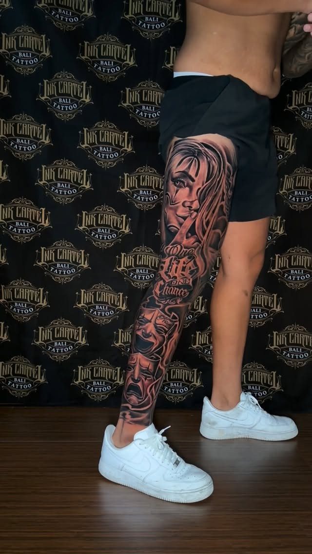 Leg Tattoo Base: 14 Placements from Ankle to Full Sleeve for 2026 3 A person's leg featuring a detailed black and grey realism full leg sleeve tattoo.